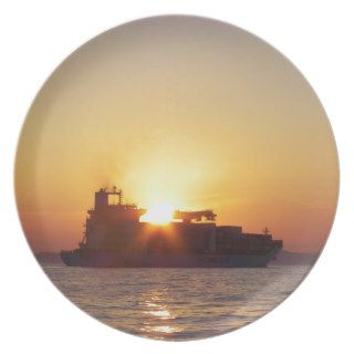 Sun Setting Behind A Container Ship Dinner Plates