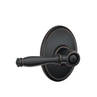 Schlage F40BIR716WKF Aged Bronze Privacy Birmingham Privacy Door Lever Set with the Decorative Wakefield Rosettes    