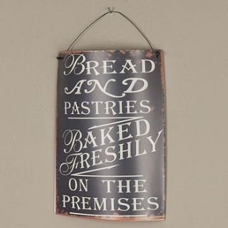 bread and pastries tin sign by dibor