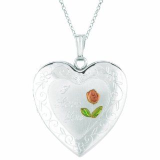 Sterling silver Heart Shaped Locket w/ rose (4 image frames) Necklace: Jewelry