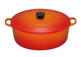 Le Creuset Enameled Cast Iron 6 3/4 Quart Oval French Oven, Flame: Kitchen & Dining