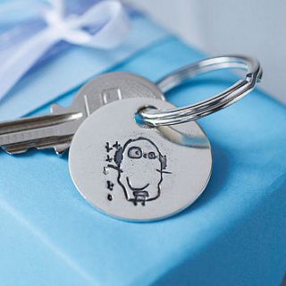 your pet's paw print key ring by touch on silver