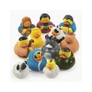 Set Includes: Mary, Joseph, Baby Jesus, 3 Wise Men, Angel, Lamb, Cow, Donkey And Camel.   One Dozen (12) Rubber Duckie Ducky Duck Christmas Nativity Scene: Toys & Games