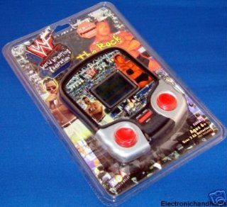 The Rock WWF World Wrestling Federation WWE The Rock Electronic Hand Held Game: Toys & Games