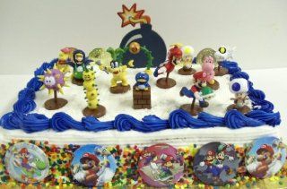 18 Piece Super Mario Brothers Cake Topper Set Featuring Running Mario with Turtle, Blue Toad, Yellow Toad, Pink Toad, Blue Yoshi, Pokey the Cactus, Puffer Blowfish, Dry Bones Dead Fish, Flyieng Mario, Decorative Bomb, and Coins Toys & Games