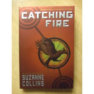 Catching Fire (The Hunger Games, Book 2): Suzanne Collins: 9780439023535: Books