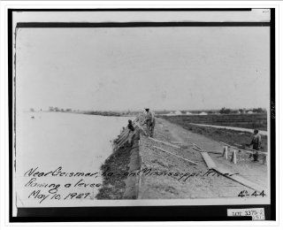 Historic Print (L): Near Geismar, La., on Mississippi River, raising a levee  