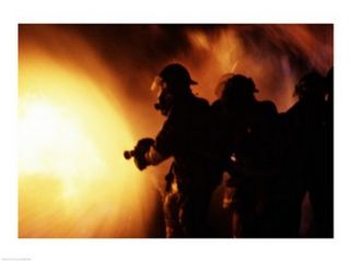 Firefighters during a rescue operation Poster Print (24 x 18)